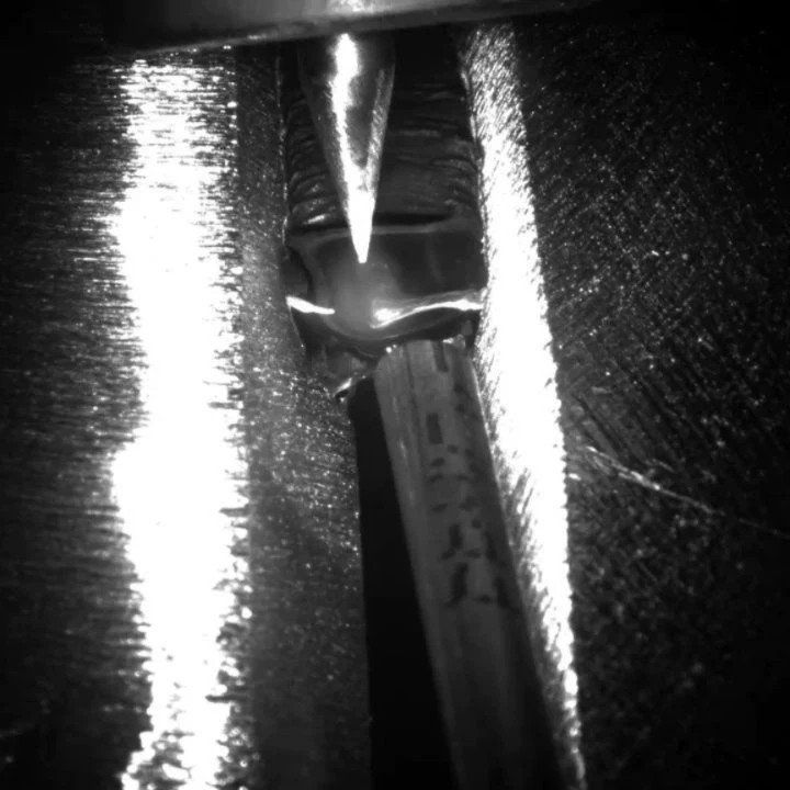 Welding-camera view of a copper-nickel root-pass demonstration