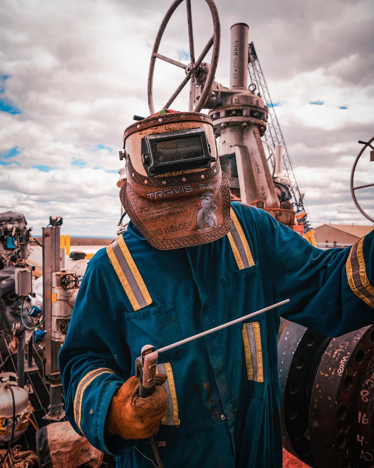 Travis Field in welding protective equipment on an industrial site